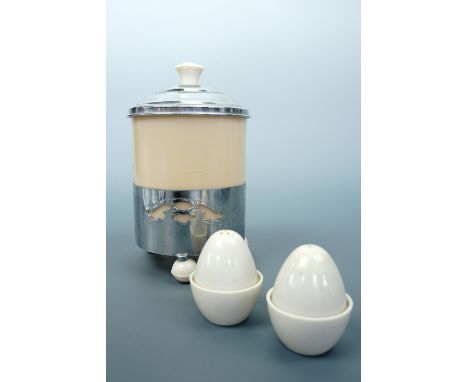 An electroplate and composition caddy together with composition oviform salt and pepper pots, c. 1930-50