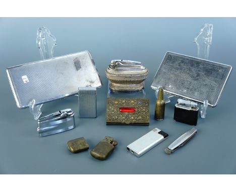 A collection of smoking related material, including Ronson and Colibri lighters, a novelty lighter in the form of a bottle, a