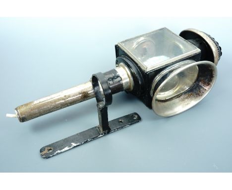 A Victorian carriage lamp and bracket 