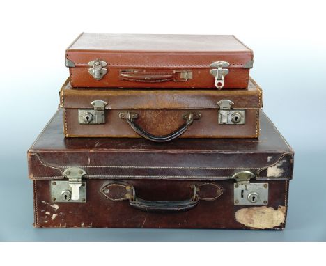 Two vintage hide suitcases and a small faux-leather case, largest 50 x 30 x 17 cm