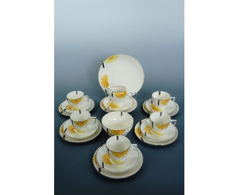 A 1930s Art Deco style sunflower teaware, (free of damage, one cup lacking)