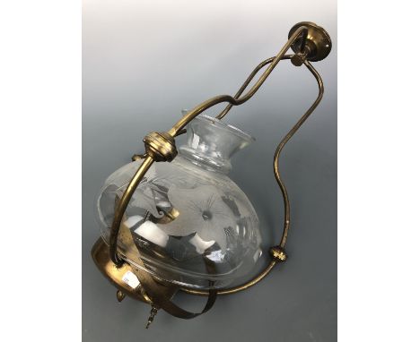 An antique pendant brass oil lamp with wheel-cut and etched glass shade, late 19th / early 20th Century, 65 cm high (total)