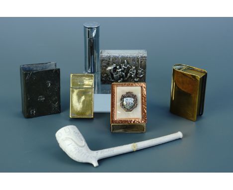 A collection of smoking related items comprising vintage lighters and vesta cases