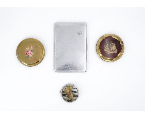 A 1930s blusher compact with butterfly wing effect cover, two further compacts and a Sylvia Chrome cigarette case the cover d