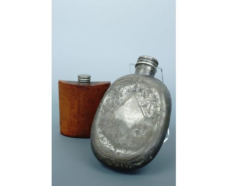 A Victorian Britannia metal hip flask together with one further leather example