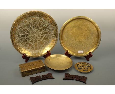 Vintage oriental brass trays, a dish and stand, trivet and box