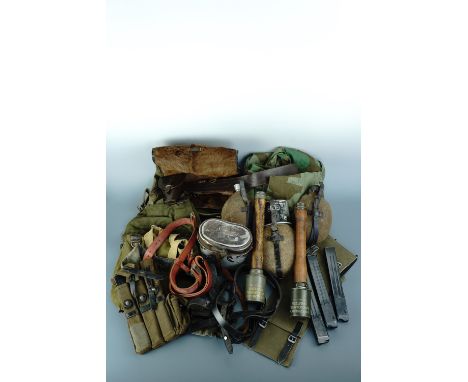 A large quantity of German Second World War Wehrmacht re-enactment kit including replica stick grenades, MP40 stick magazines