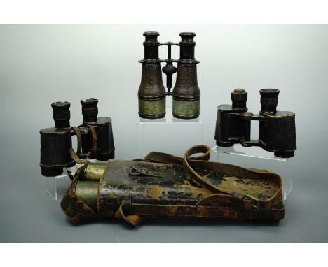 Two sets of Great War British army binoculars together with 1940 dated No 2 prismatic prismatic binoculars and a late 19th Ce