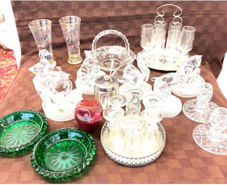 Selection of glassware includes royal rock crystal figurines, tantalus, cut glass candle stick  etc 