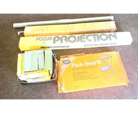 3 Projector screens and a selection of slide magazines