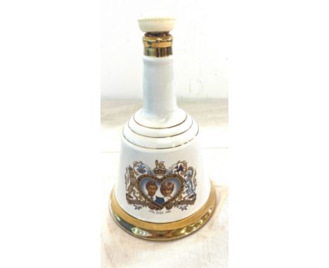 Large Bells scotch whisky in a wade bottle full with contents 