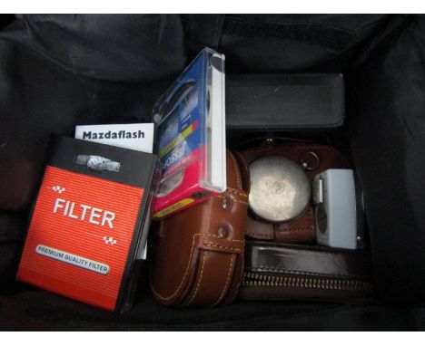 A case of various light meters