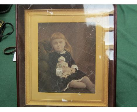 A 19th Century photograph portrait of seated girl with doll, highlighted, with gilt painted frame