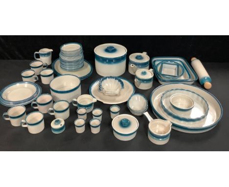 A Wedgwood Blue Pacific pattern dinner and kitchen ware service, including two teapots, scallop shaped fish serving platter a