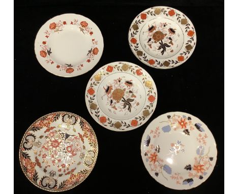 A Royal Crown Derby Imari Beaumont pattern dinner plate, 27cm diameter, second; a pair of 8687 pattern dinner plates, seconds