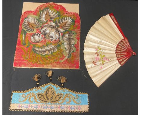 A large 19th century silk fan, painted with flowers, 34cm high; a 19th century beadwork panel, 48cm x 42cm; another, 17cm x 4