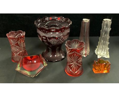 A late 19th century Bohemian ruby flashed glass vase, 20cm; a similar pair of waisted cylindrical vases, 14cm; a Czech cubist