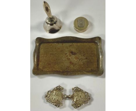 A George V silver dressing table trinket tray, Birmingham 1930; a silver hafted table bell; a silver pill box; an Art Nouveau