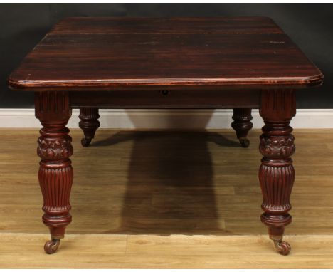 A late Victorian extending dining table, bearing fragmentary plaque for James Shoolbred &amp; Co, Tottenham House, Tottenham 