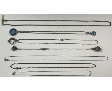 An Art Nouveau style silver pendant and chain; enamel pendants; silver chains; an Albert chain 