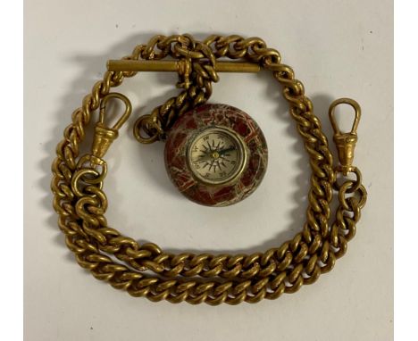 A Victorian gilt metal double Albert chain, with serpentine compass fob, 36cm long 