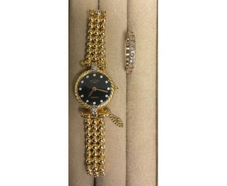 An unmarked gold eternity ring, clear stones, size M, 2.2g; a lady's Rotary watch, black dial, integral bracelet strap (2) 