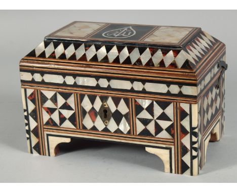A TURKISH OTTOMAN MOTHER OF PEARL AND TORTOISESHELL INLAID QURAN BOX, inlaid with geometric design, the hinged lid with quran
