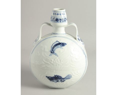 A CHINESE BLUE AND WHITE PORCELAIN TWIN HANDLED MOON FLASK, painted with fish and lotus, and further decorated with carved aq