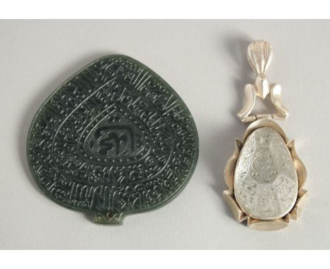 AN ISLAMIC ROCK CRYSTAL CALLIGRAPHIC DROP PENDANT, together with a carved jade calligraphic pendant, 6cm x 5.5cm, (2).