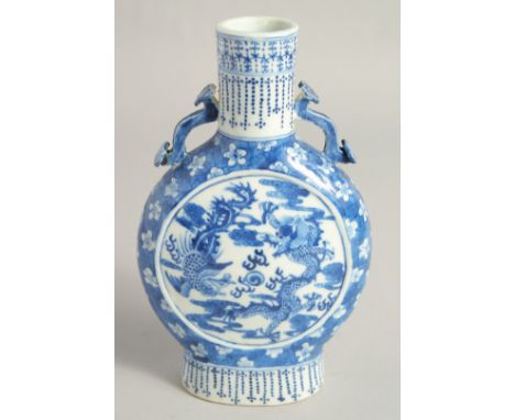 A SMALL CHINESE BLUE AND WHITE PORCELAIN MOON FLASK, with moulded ruyi scepter handles and painted with a central panel depic