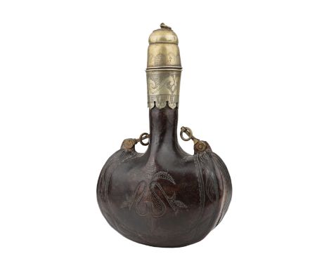 A rare large inscribed brass-mounted leather flask, North India, 19th century, of typical crescent shape with slightly scroll