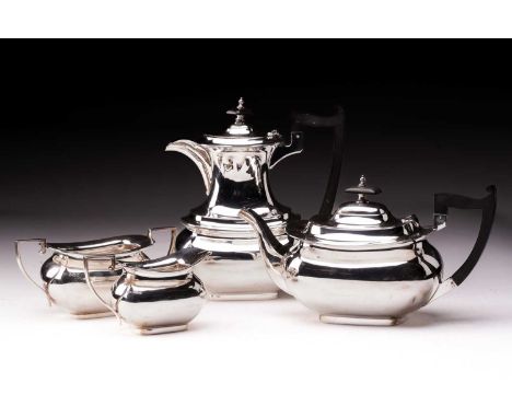 A 1930s silver four-piece tea set of pot-bellied form, Sheffield 1939 by Walker &amp; Hall. the set comprises a teapot, hot w