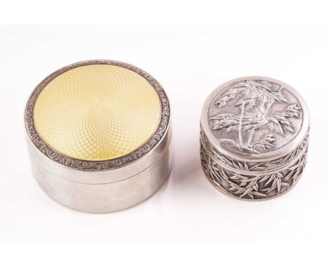 A round silver dressing box, the cover with pale yellow guilloche enamel, Birmingham 1924, 6.5cm diameter and a Chinese Wang 