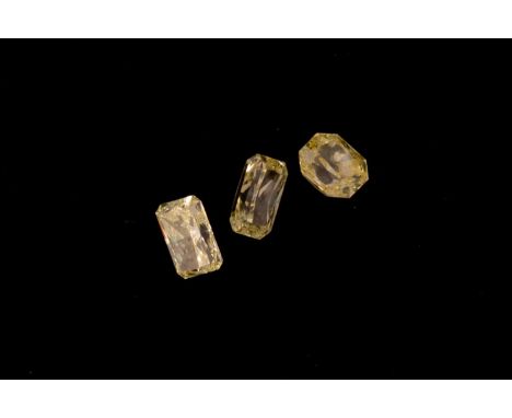 Three loose light fancy yellow diamonds.Light yellow diamond measuring 3.91 x 5.71 x 2.71mm - SI1 -0.58ct Light yellow diamon