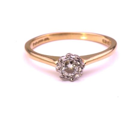 A diamond solitaire ring in 18ct gold, comprising a circular-cut diamond of 3.8 x 3.8 x 1.9 mm, in an illusion setting with t