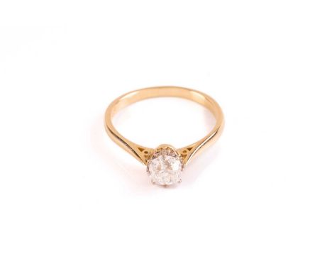 A single stone diamond ring; the old cushion cut diamond in claw mounts to a later plain tapering 18 carat gold shank. Diamon