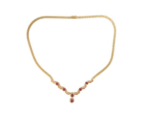 A ruby and diamond necklace, the pendant contains two articulated clusters with scalloped edges, where an oval-cut ruby is en
