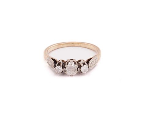 A three stone diamond half hoop ring; the three mixed old cut diamonds in claw mounts above textured shoulders and plain shan