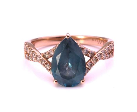 A topaz and diamond dress ring in 14ct pink gold, by Le Vian, featuring a pear-shaped London blue topaz of 11.6 x 7.9 mm at t