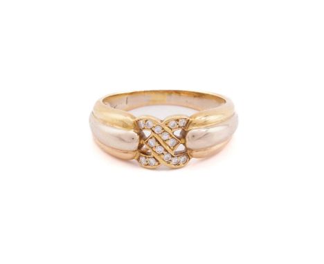 A tri-coloured dress ring set with diamonds, with an interlocking centre motif set with round diamonds, to ridged shoulders a