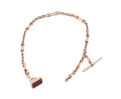 A 9ct pink gold Albert chain with fob seal, the Figaro link chain is terminated with a swivel clasps on both ends, attaching 