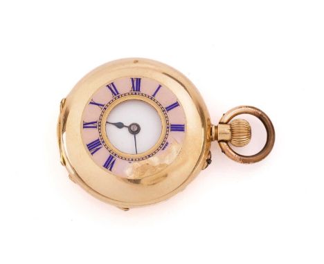 A half-hunter fob pocket watch in yellow metal stamped 18kt, with a keyless movement in a case measuring 33.5mm with a white 