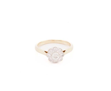 A diamond flowerhead cluster ring, centred with a brilliant-cut diamond of 4.4 mm, encircled by eight smaller round diamonds 
