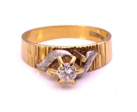 A diamond solitaire ring, featuring a round brilliant-cut diamond of 4.3 mm, in a raised high-profile claw setting, adorned w