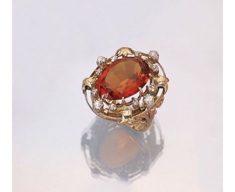 18 kt Gold Ring mit Citrin und Diamanten,   GG 750/000 und Silber, mittig ovalfacett. Citrin ca. 16.0 ct, erhaben in Krappenf