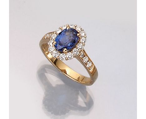 18 kt Gold Ring mit Saphir und Brillanten,   GG 750/000, ovalfacett. Saphir ca. 2.27 ct,20 Brillanten zus. ca. 0.64 ct Weiß/s