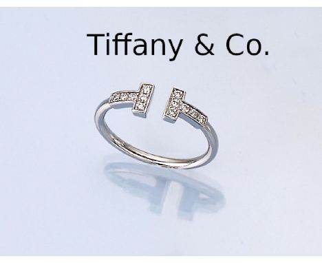 18 kt Gold TIFFANY &amp; CO. Ring,   WG 750/000, T-Wire, 12 Brillanten zus. ca. 0.12 ct Weiß/siRW 53, ca. 2.6 g18 kt gold TIF