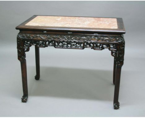 CHINESE HARDWOOD SIDE TABLE, possibly late 18th century, pink marble inset top above a scrolling foliate carved frieze and pi