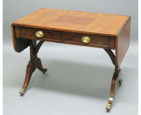 GEORGE III MAHOGANY SOFA TABLE, the crossbanded, rounded rectangular top with twin drop leaves, above two true and two faux d