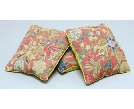 THREE FLORAL TAPESTRY CUSHIONS, the fabric 19th century with flowers and foliage on a deep pink ground, each panel approximat